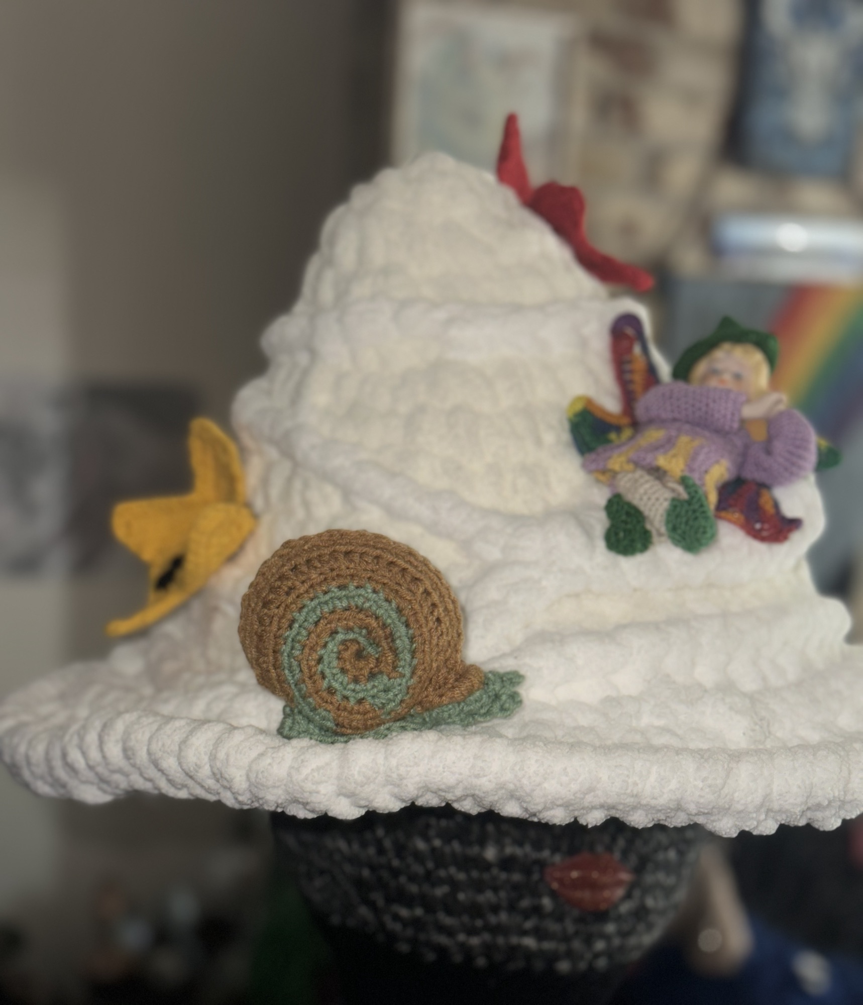 mushroom hat with a sleeping fairy